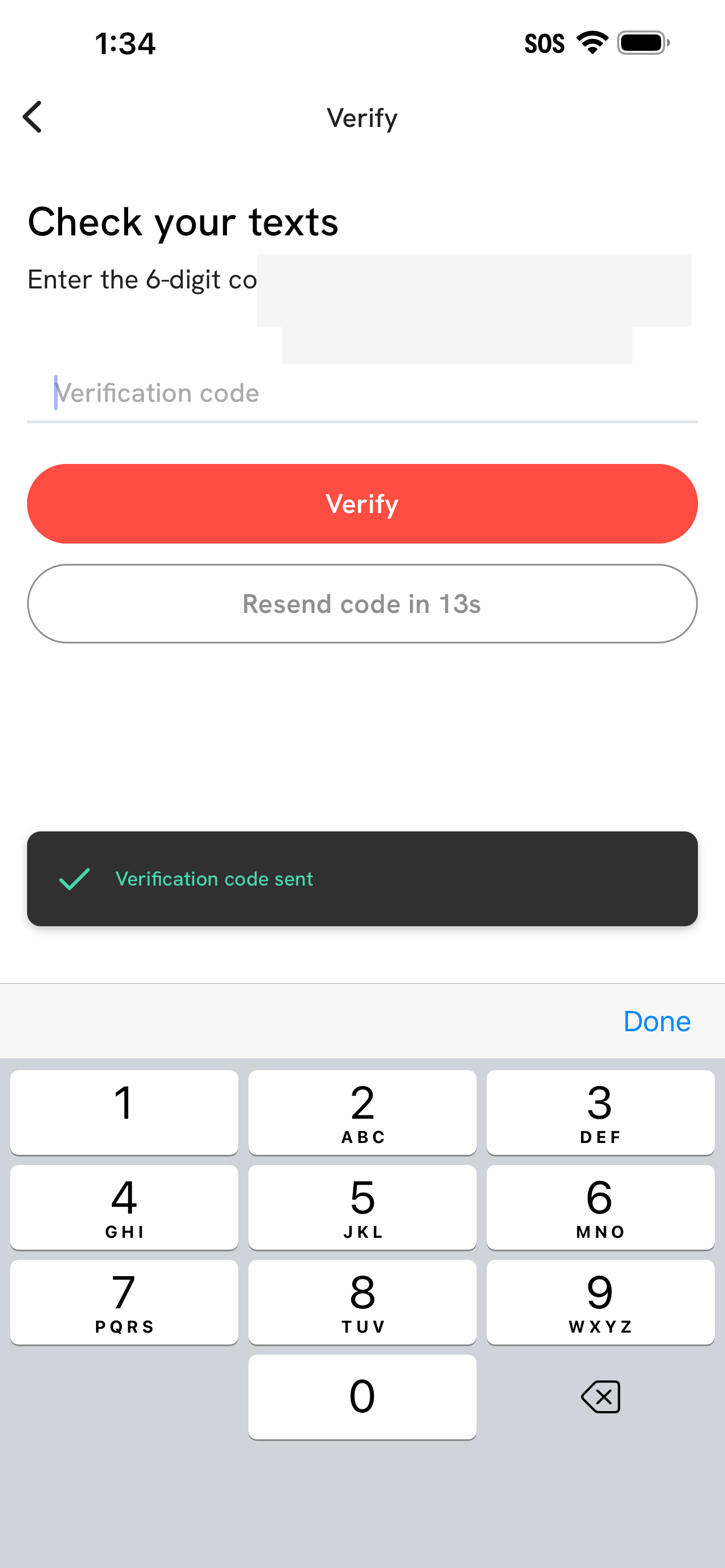 Redacted Solin app screen showing the phone verification code step.