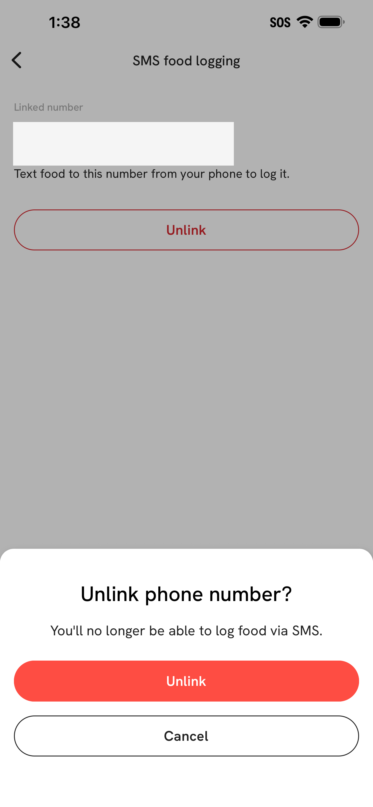 Redacted Solin app screen showing the unlink phone number confirmation.